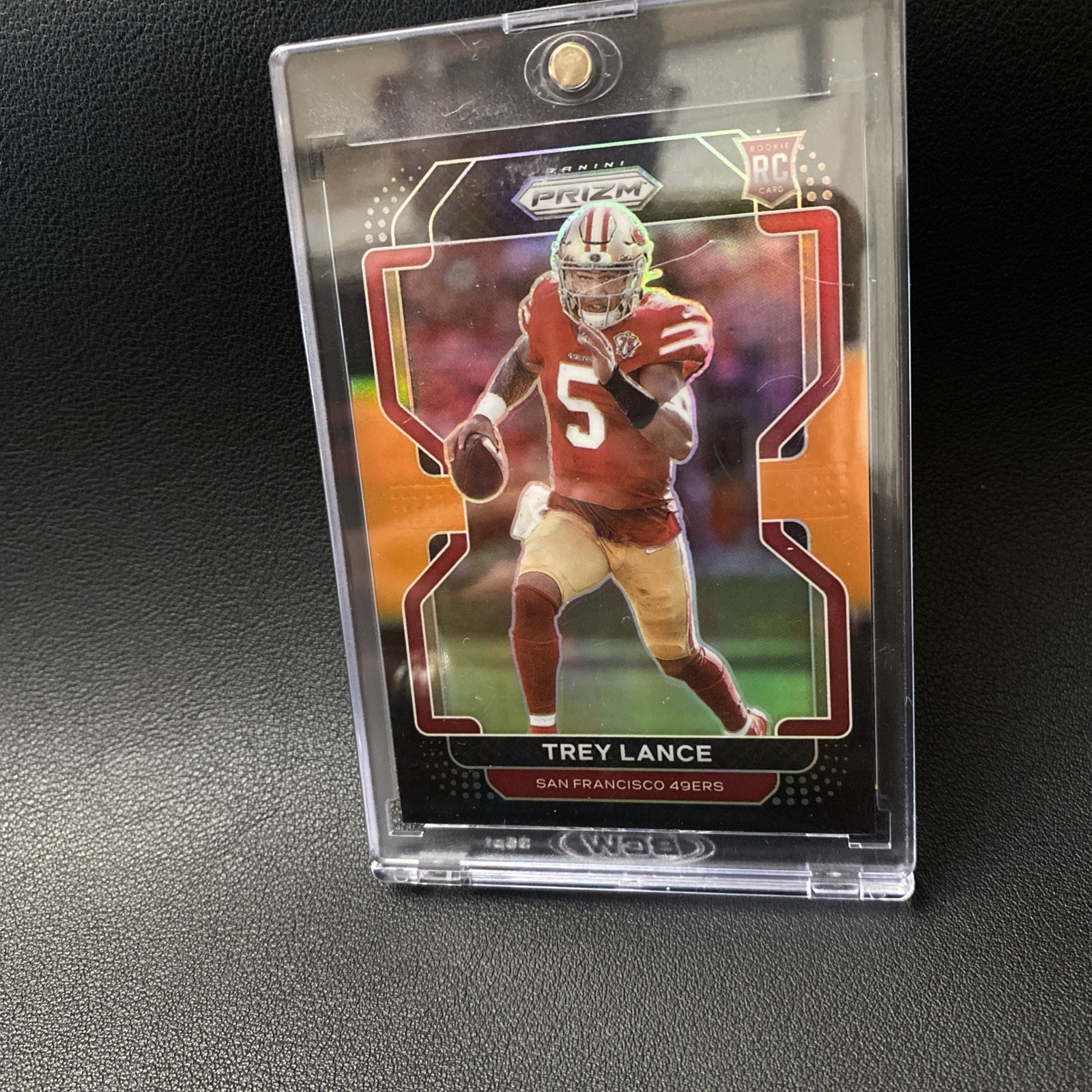 2021 Panini Chronicles Trey Lance RC Prizm Black Orange Prizm 14/75