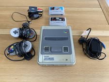 Super Nintendo SNES Console Bundle With 2 Controllers, Mario Kart And Star Wars