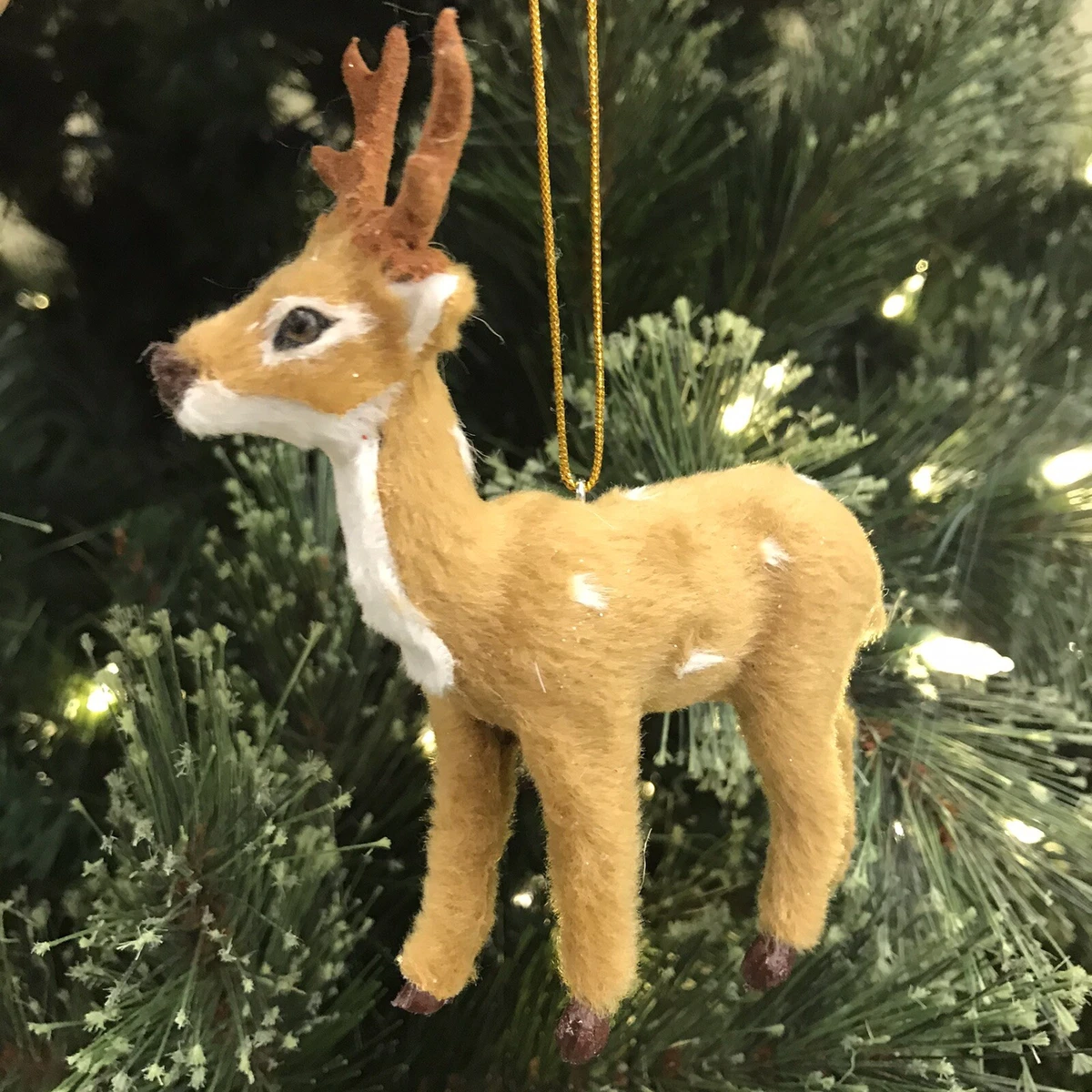 Christmas tree with sale antlers