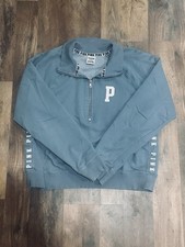 Victoria's Secret PINK half-zip pullover sweatshirt in a solid teal Color.