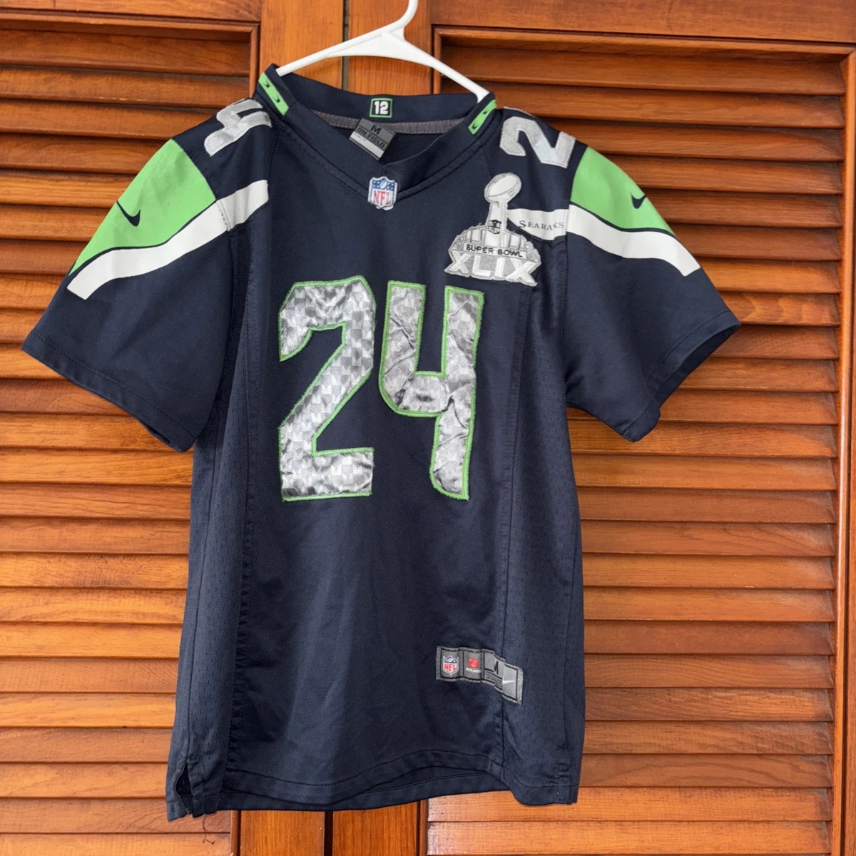 Preços baixos em Seattle Seahawks marshawn Lynch Roupas e