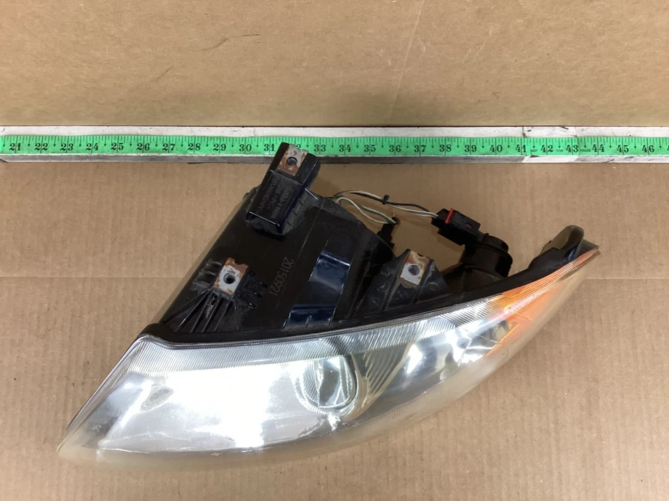Conjunto de faros delanteros izquierdo del lado del conductor Dodge Caravan 2004-2007 OEM Foto 2 de 4