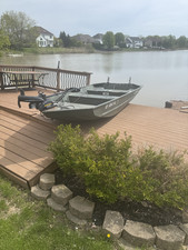 used aluminium jon boat with bow mounted motor (will deliver)