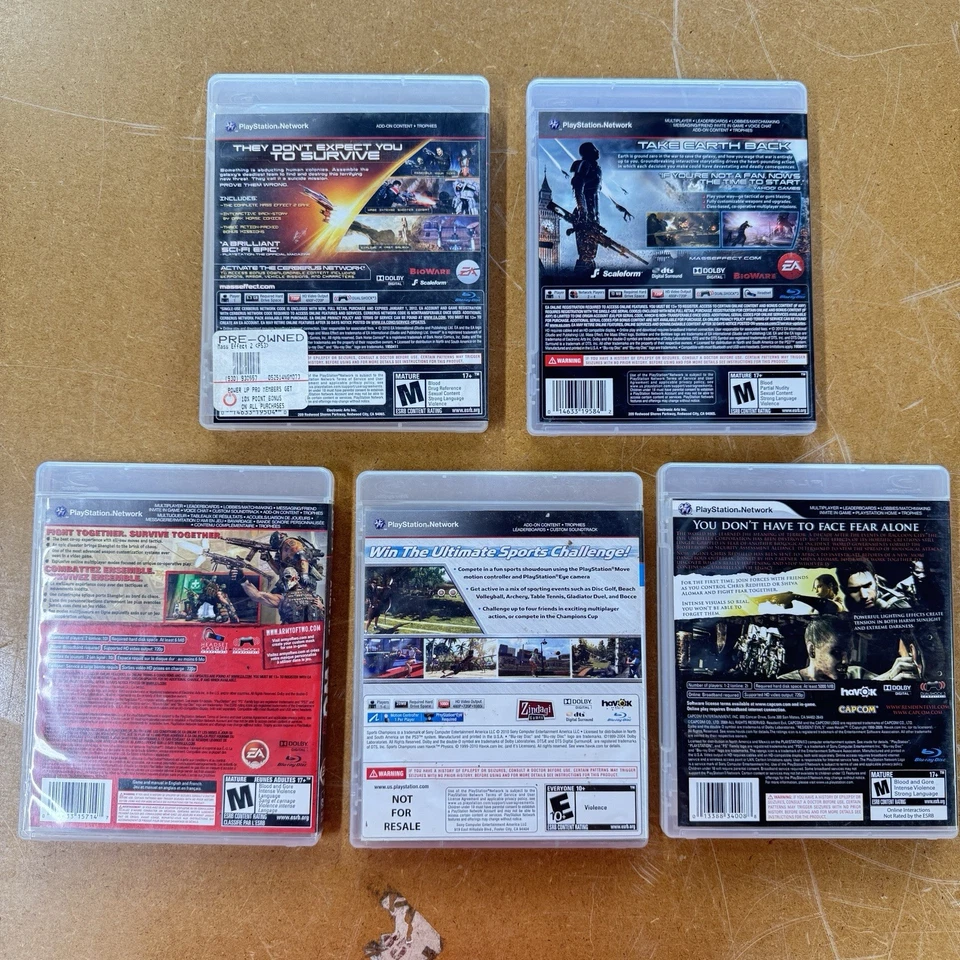Lote de juegos PS3 x5 Mass Effect 2 y 3, Resident Evil 5, Army of Two, Sports Champion Foto 2 de 4
