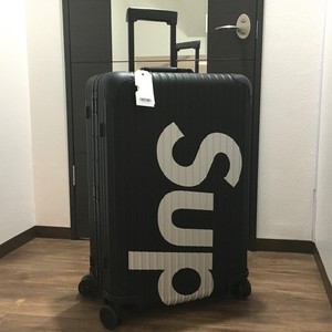 rimowa supreme suitcase