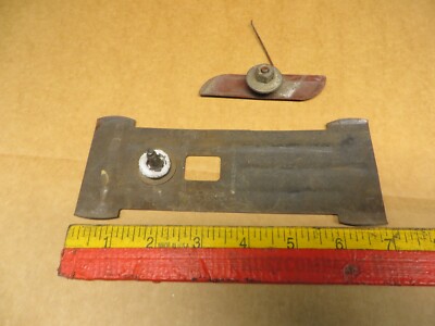 Used OEM Lincoln Mark VII Body Side Molding Bracket – With Stud, Surface Rust Present