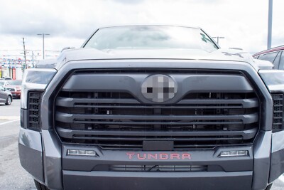 What is the best way to modify the Toyota logo and vent area with red front bumper letter inserts