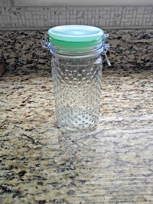Amici Home Emma Jade Hobnail 36 oz Canister Dimpled Texture Jade-colored lid