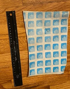 USED SQUARE INTEX POOL LINER PATCH - MEASURES ABOUT 10 INCHES BY 6 INCHES