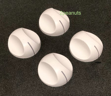 Set of 4 white Kenmore burner control knobs part  WB3K5099 stove range