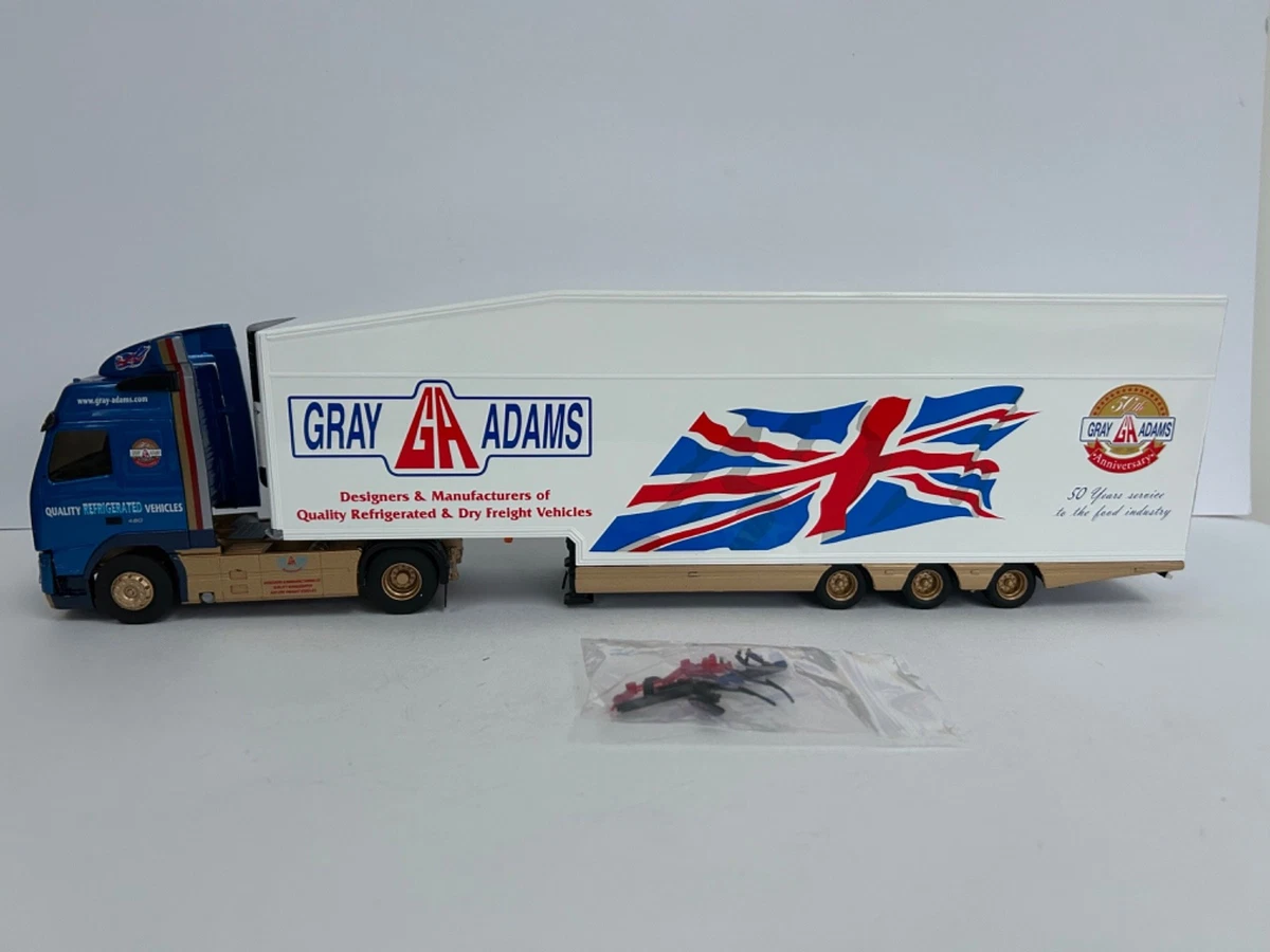 A green Tuffnells parcels express delivery van England uk Stock Photo