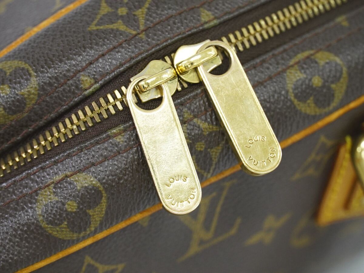 Louis Vuitton Manhattan PM M Monogram Canvas Handbag Brown