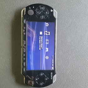 Sony PSP-3000 Black Handheld System Wi-Fi Bundle w/ Charger Case & 2 Games