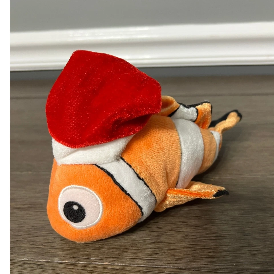 Peluche retirado Disney Store Tradiciones exclusivo Pixar Buscando a Nemo Santa Foto 2 de 4