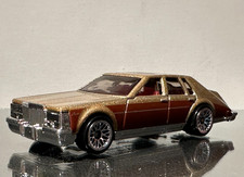 Hot Wheels 2023 Gold Cadillac Seville TM GMHW: The 80's 7/10  LOOSE