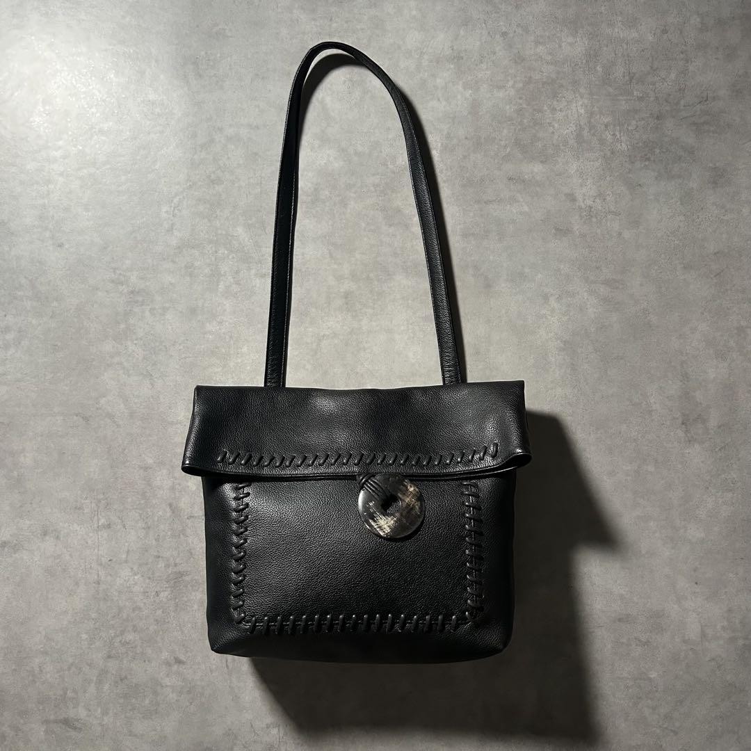 Yves Saint Laurent Black Leather Tote Bag with Tassel Shoulder Strap Pre-Owned