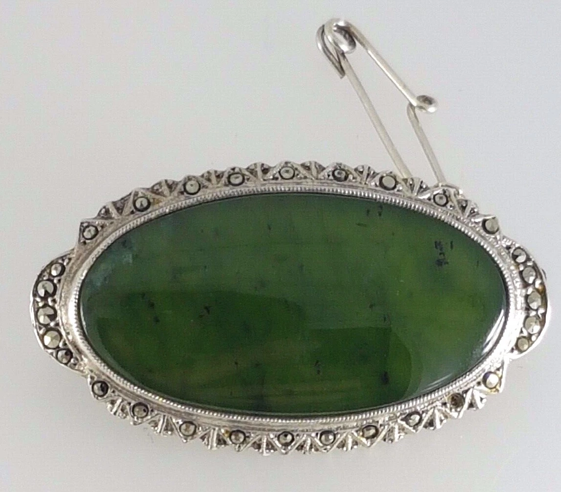 Green stone deals brooch