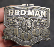 Vintage Red Man Chewing Tobacco Brass Belt Buckle 100th Anniversary Collectable
