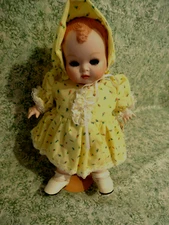 LC-2379 All-Porcelain 'MELLISSA'' doll, molded hair; 11" tall; can sit; 1985
