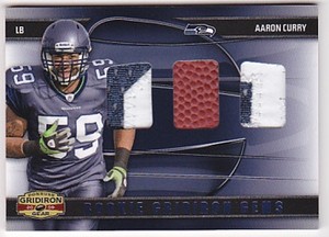 AARON-CURRY-RC-2009-GRIDIRON-GEAR-GEMS-DUAL-2CLR-JERSEY-PATCH-BALL-28-50-FB2106