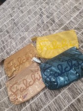 (4) Sacchetti trucco Carlos Falchi finta pelle di serpente 3-nuovi con etichette 1-nuovi senza etichette colori misti