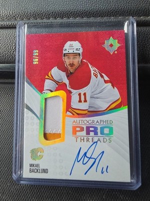 Mikael Backlund 2023-24 Upper Deck Ultimate Pro Threads Patch Auto /99 #PT-MB
