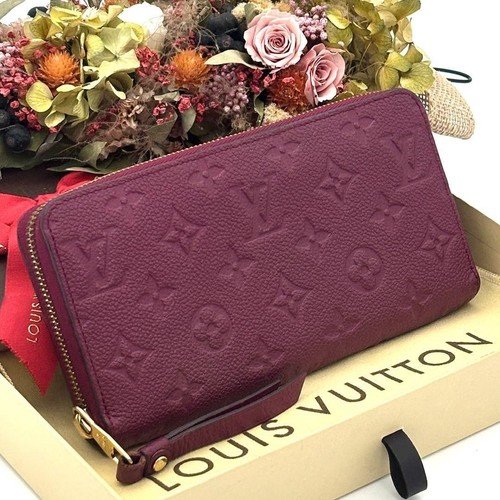 Louis Vuitton Zippy Wallet Empreinte Monogram Long Wallet Aurore pink M60549