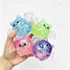 Nice Cube Trick or Treat Glitter Squishy Tactile Squeeze Toy Multicolor