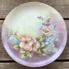 1981 Clara O’Neil Hand Painted 8” Plate Beautiful Florals on Purple Background