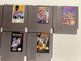 Nintendo NES console bundle with controllers, zapper, and games Tested