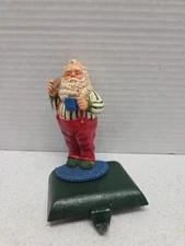 Santa Claus Eating Cookie Christmas Stocking Holder Hanger Cast Iron 4.5” Tall