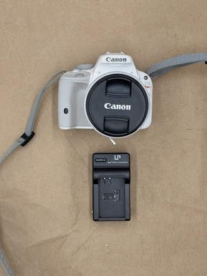 Canon EOS Rebel SL1 / EOS 100D 18.0MP  (w/ 18-55mm lens and charger)