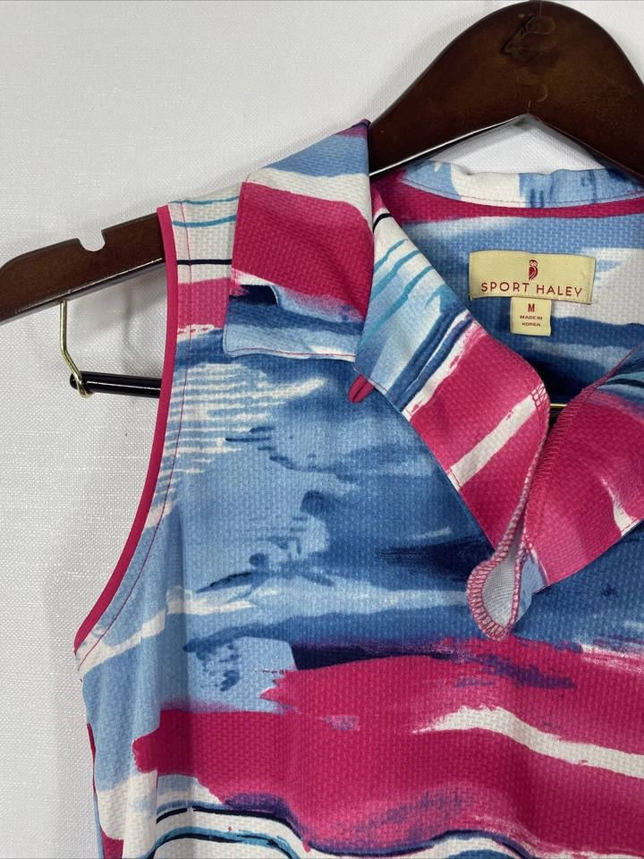 Polo deportivo Haley con cuello con volantes mediano para dama Foto 2 de 4