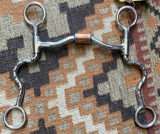 Low port barrel mouth SI Western bit w/spotted cheeks, independent side movement