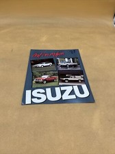 1987 ISUZU IN MOTION DEALER SHOWROOM SALES BROCHURE CATALOG GUIDE BOOKLET.