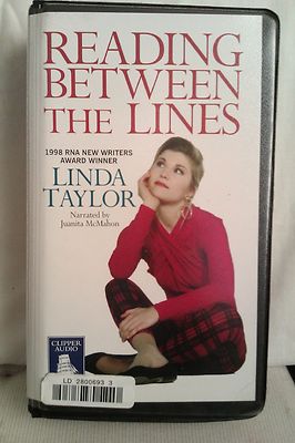 Reading Between the Lines by Linda Taylor: Unabridged Cassette Audiobook (GG5)