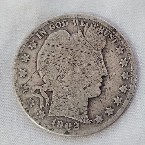 1902 S Barber Half Dollar in Poor Condition with lots of scratches