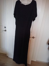 Ladies Black Playsiut In Size 12-14 Brand New