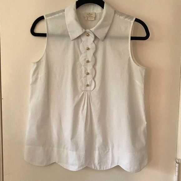 white sleeveless blouse with peter pan collar