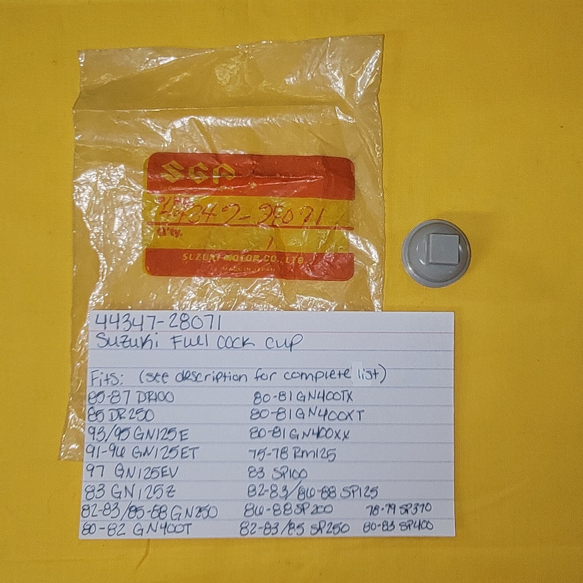 NOS OEM Suzuki Fuel Cock Strainer Cup 44347-28071 DR100 RM125