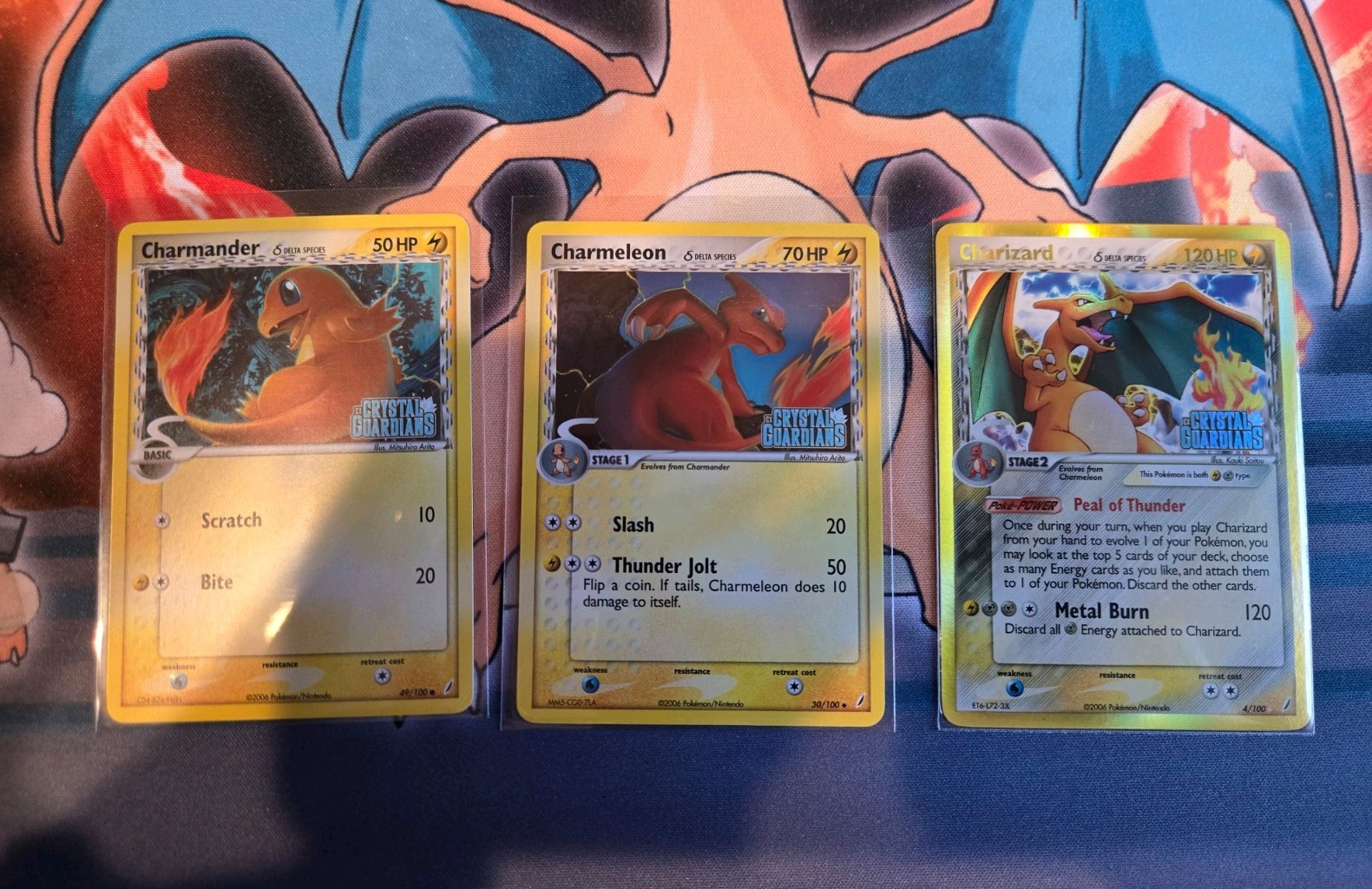 Crystal Guardians Charizard #4/100 Delta Species, NM, Stamped Evolution Chain