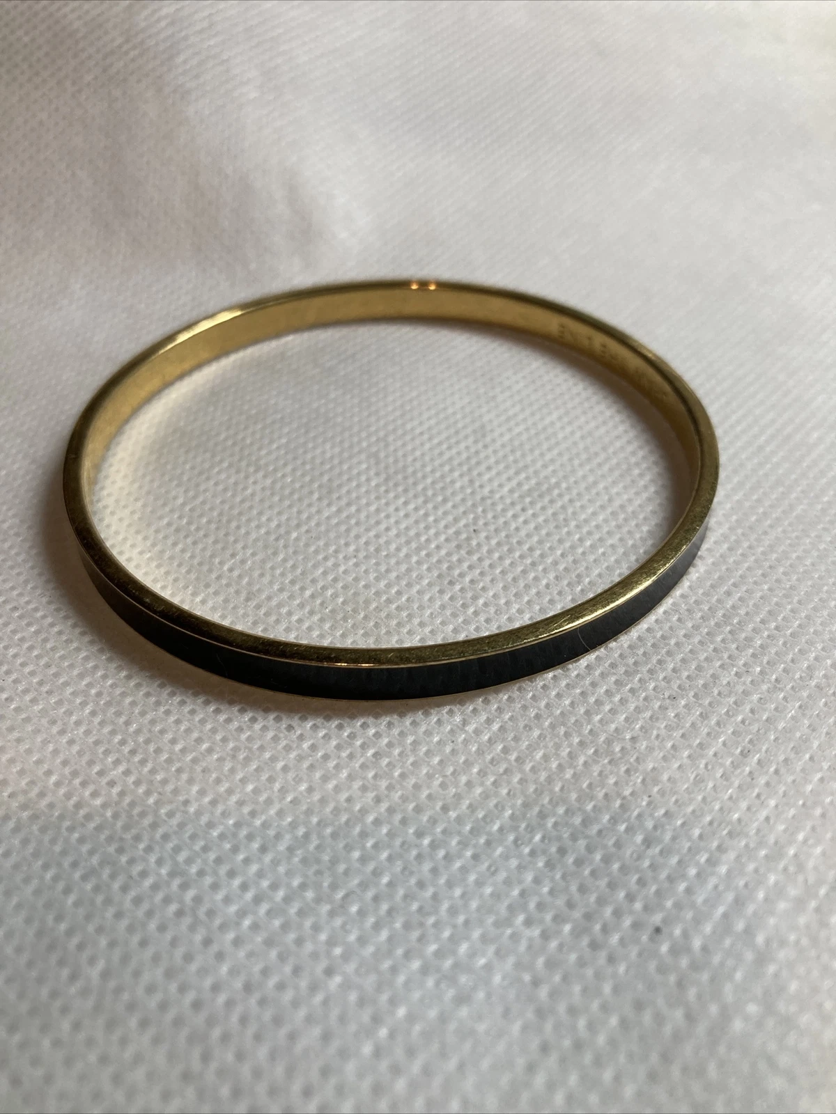 Bracciale Kate Spade nero e oro disegna la linea 7 5” b84