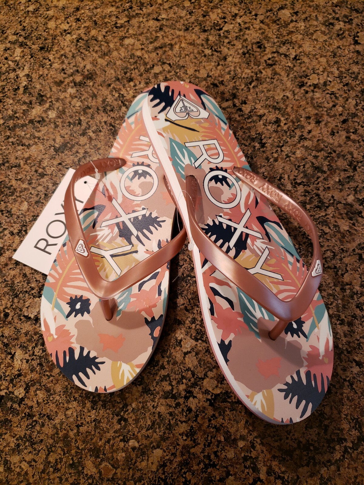 roxy rose gold flip flops