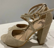 Gold glitter heels from Windsor Size 5.5