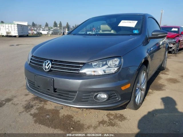 TAN LEFT FRONT DOOR TRIM PANEL 2008 VOLKSWAGEN EOS Foto 3 de 4