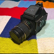 Mamiya 645 With Prism viewfinder and 150mm Lens.