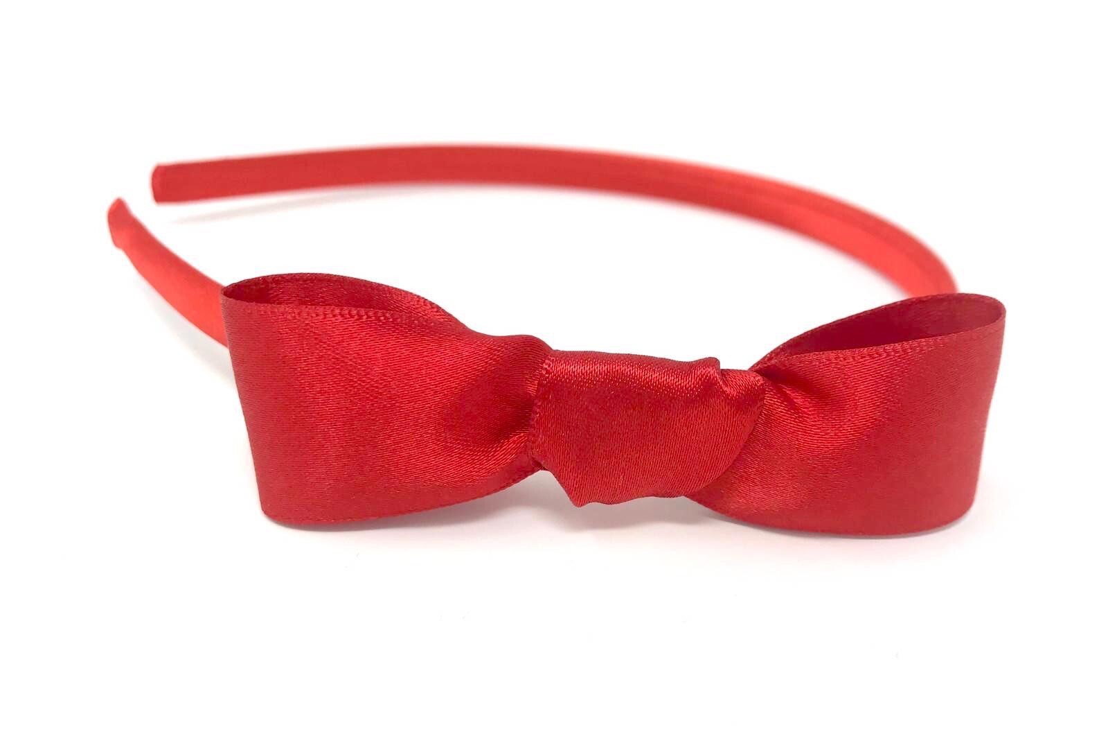 red head band with bow