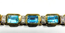 Fabulous 10K Yellow Gold 9.0 ctw Sky Blue Topaz and Diamonds Bracelet One Only