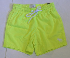 bright yellow swim shorts