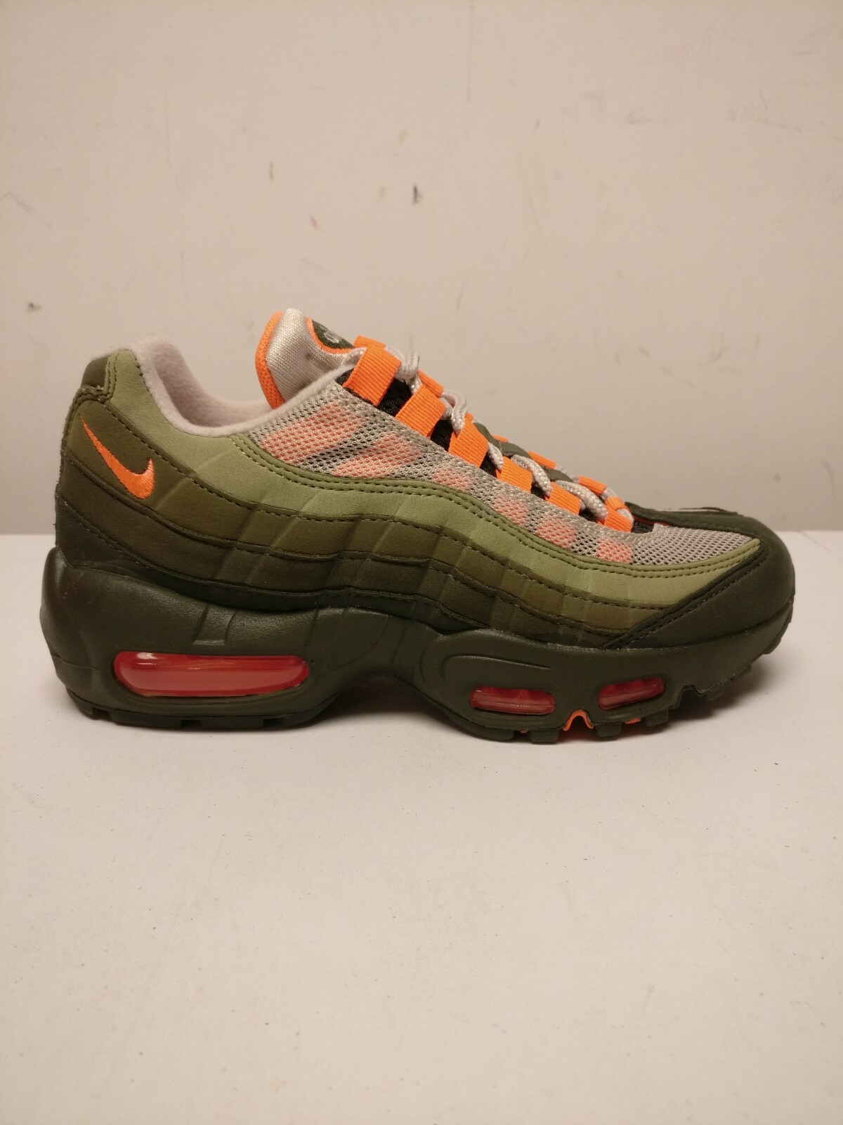 olive green and orange air max